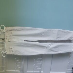 MOTHER The Looker Crop Sexy Just Walked Into Town Jeans In Cool Ivory Distressed